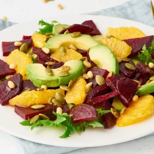 Healthy Beetroot, Avocado and Orange Salad with Pumpkin Seeds.